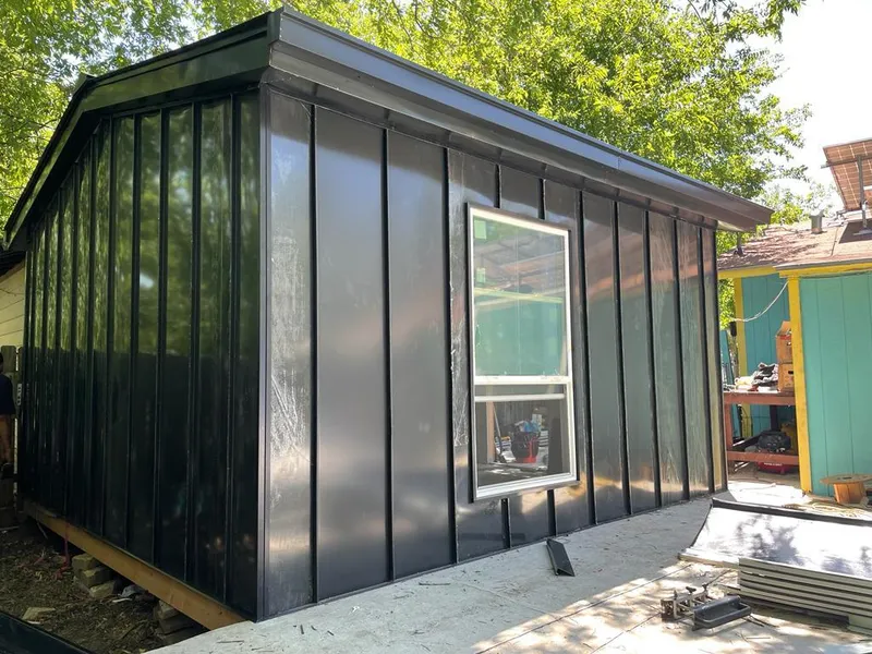 Black standing seam metal wall panels for Roof Inspection in American Fork